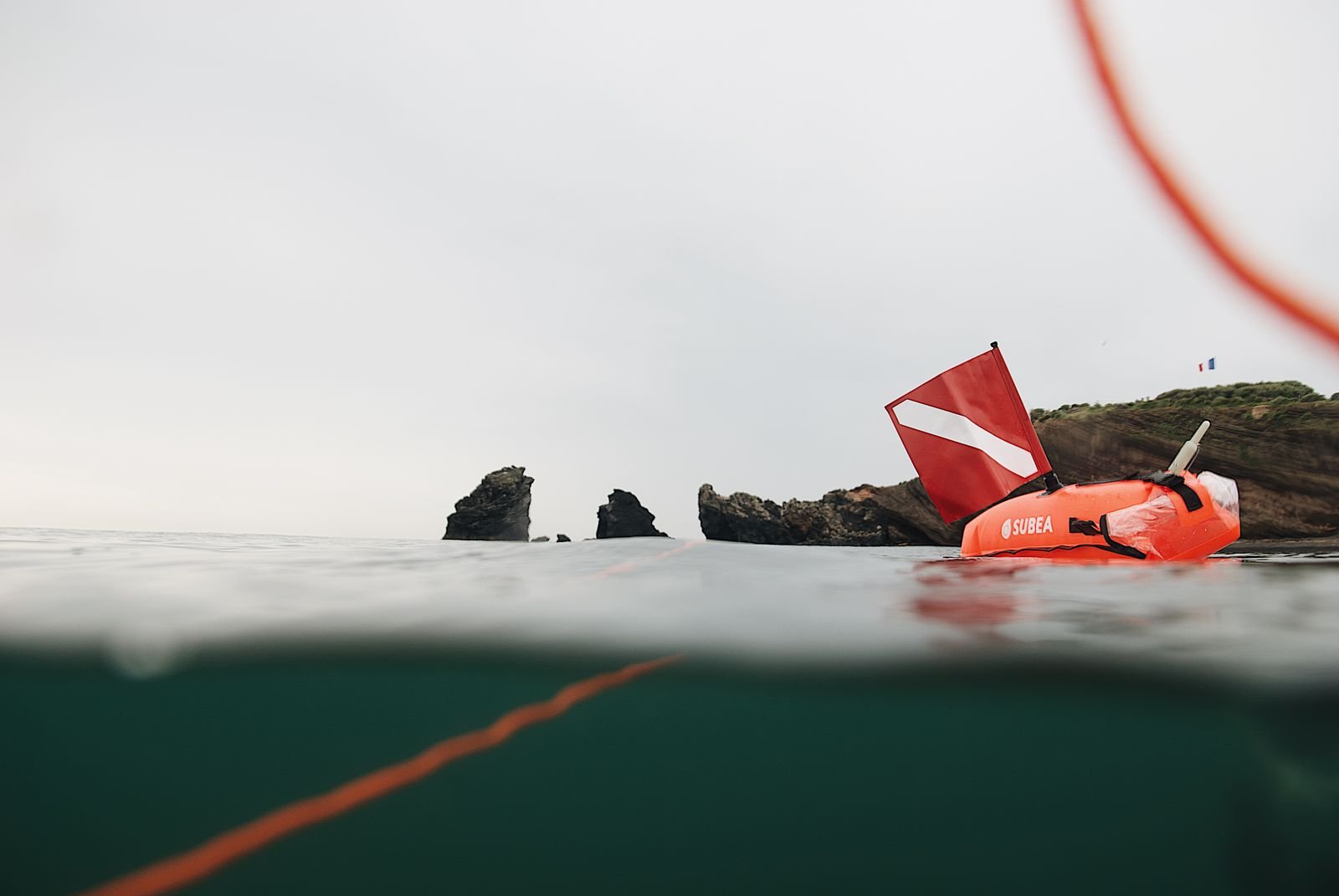 DSMB delayed surface marker buoy deployed at the surface during a dive
